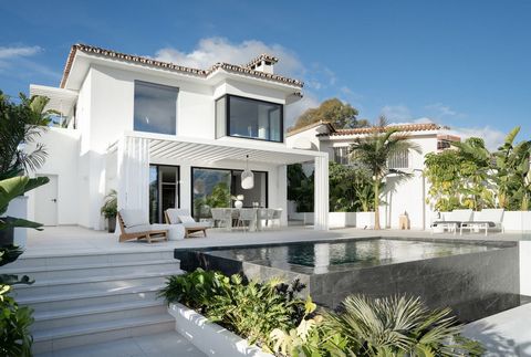 Totally reformed and exceptionally designed villa situated in the hills of the charming lower part of Nueva Andalucia, with walking distance to the fashionable Puerto Banus, and the beach. This villa is divided into 2 floors offering a living room wi...