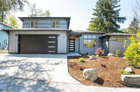 The One You've been waiting for! This Gorgeous, Brand New, Zero Step Entry, Main Floor Living home is the only one available in a small enclave of luxury homes near Whatcom Falls & Galbraith Mtn. You will be wowed when You enter the spacious, 12' hig...