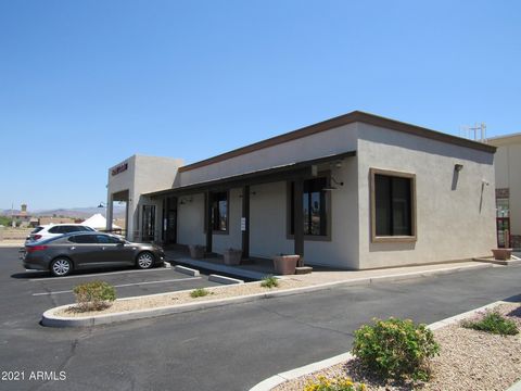 It is a freestanding building constructed as a bank building with a drive through teller window. Excellent exposure and right in the heart of Desert Hills. You will not find any comparable building or opportunity for miles around. This is the heart o...