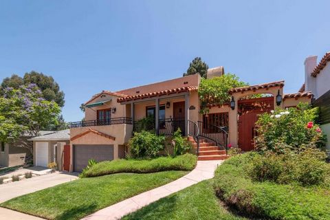 Classic Spanish in Kensington located atop a beautiful tree-filled canyon. The house exudes charm with a front porch balcony and an inviting entrance to the backyard. The living room has a large picture window overlooking the neighborhood. The family...