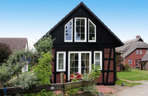 Charming half-timbered house with sauna and harbor view only 150 m from the Szczecin Lagoon. The house is situated on a quiet 3,000 m² garden/nature property, of which 300 m² are at your disposal. Spend cozy evenings on the newly built balcony and wa...