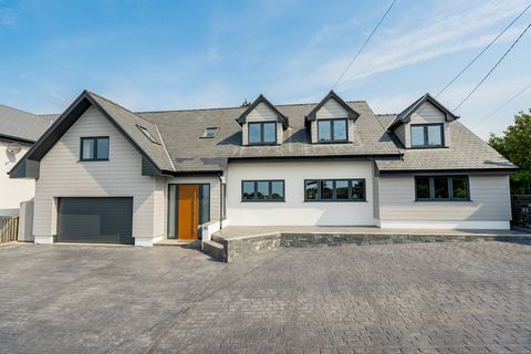This exquisite contemporary family home is located in the charming village of Three Crosses, renowned for its close-knit community, breath-taking vistas, and convenient proximity to the renowned Gower Peninsula. This splendid, detached property offer...