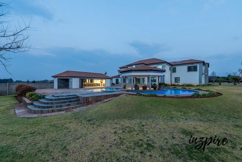 Now negotiating from ZAR12.65 million. A secure equestrian estate in the popular Blue Saddle Ranches - Meyerton, located on the outskirts of Johannesburg. The stately 20 000sqm residence of grand proportions was built with a large and extended family...
