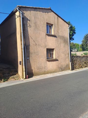In a charming little village on the Larzac Méridional, village house of 57m2 with beautiful volumes. On the ground floor, an entrance of 4m2 leads to a large living room of 22.63m2 (with kitchen), and a bathroom of 4.34m2 with shower/toilet and windo...