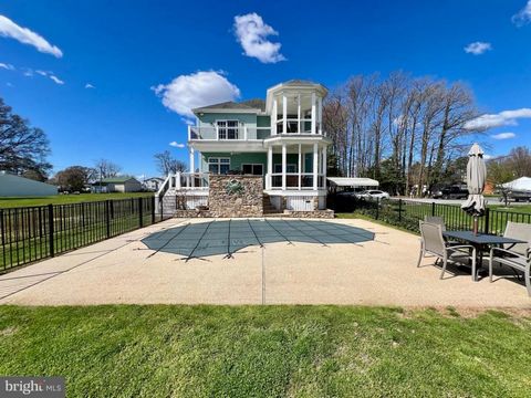 Luxurious Waterfront Oasis Awaits at 1419 Chesapeake Rd. Immerse yourself in unparalleled comfort and lavish upgrades in this waterfront masterpiece. This home boasts an entertainer's dream with its expansive living areas and resort-style yard. Insid...