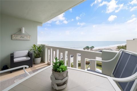 Wake up to the waves! This 5th floor unit with ocean views offers not just a home, but a lifestyle. Located just a short walk from local restaurants and shops this 2 bedroom, 2 bath unit includes an attached 1 car garage, features wood-plank tile, gr...