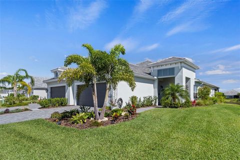 This Stunning 2/2/2 with Office/Den and a water view awaits you! Located in the award-winning Grand Palm community, this home brings lifestyle and luxury together. This open concept design offers plenty of space for entertaining and guests. Hurricane...