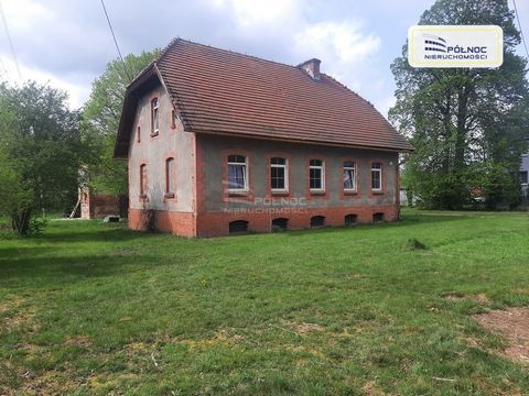 PÓŁNOC NIERUCHOMOŚCI offers for sale a real estate developed with a residential building located in Zebrzydowa, Nowogrodziec commune. OFFER DETAILS: - The property is a residential building with a total area of about 200 m2 located on a charming plot...