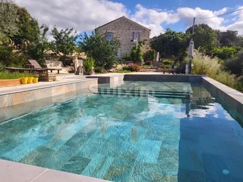 Ref: 66683CJ Vallée de la Cèze, 40 minutes from Avignon TGV station, on the heights of a pretty village, discover this authentic Provencal farmhouse with exceptional volumes bathed in sunshine! Renovated to a very high standard, this property offers ...