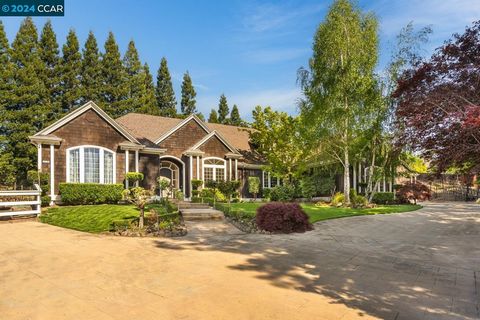 Nestled at Erselia Trail's end, this single-level estate on nearly an acre impresses with a 4,214 sqft main house and a charming 914 sqft ADU. Craftsmanship shines with crown molding, wainscoting, and custom casings. High ceilings, hardwood floors, a...