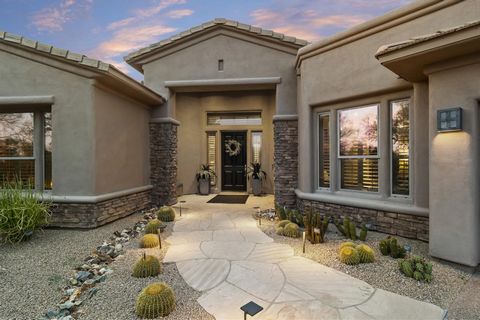 Once in a lifetime opportunity to own an award-winning masterpiece inside the luxury gated-community of Saguaro Highlands. Featuring 132 semi-custom residences situated comfortably on 1+ acre lots, this popular Cerro floorplan is in a league of its o...