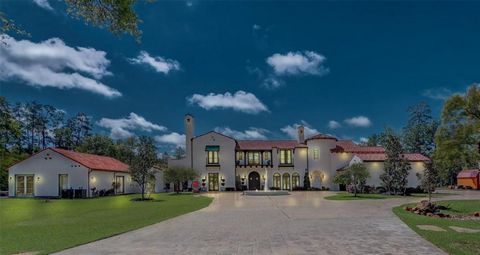 Welcome to this Spanish Colonial/Modern home with a private gate entry designed by Elby Martin, sitting on 7.35 horse-friendly acres. The property is located immediately behind The Woodlands. The home's exterior features two small lakes for fishing, ...