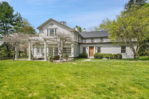 Fully restored, super chic antique farmhouse on simply beautiful land with a charming guest cottage. High ceilings, arched doorways, original millwork, gorgeous refinished wideplank floors, beautiful windows and five fireplaces. Bespoke Clive Christi...