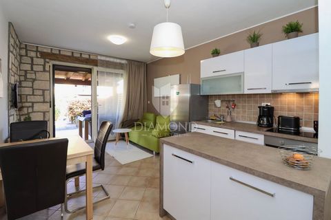 Location: Istarska županija, Poreč, Poreč. Poreč, fantastic apartment on the ground floor with a garden, swimming pool and tennis court In Poreč, in a great location, this excellent apartment on the ground floor is for sale. Its total area is 46.91 m...