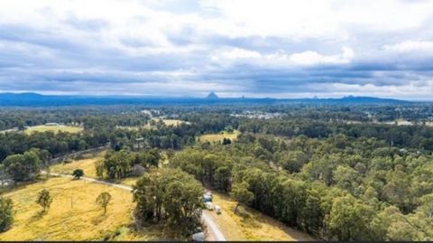 Welcome to a unique opportunity to own a sprawling 160-acre property, fully fenced, in the picturesque Delaneys Creek. This expansive estate features two distinct dwellings, offering endless potential for living, investment, or a combination of both....