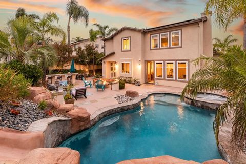 Exquisite La Costa Valley Estate! Nestled on pristine manicured grounds marked by a stunning lagoon and spa, this estate masterfully combines Mediterranean elegance with timeless design, offering the utmost in modern convenience. The refined open int...
