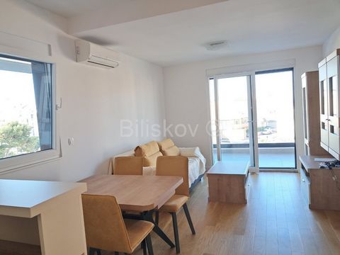 Split, Visoka, in a residential building with an elevator, an apartment with a total usable area of ​​52m2. It consists of a kitchen with a dining room and a living room, a bedroom, a bathroom, a toilet and a loggia. The apartment is located in a new...