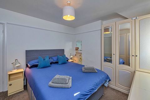 This spacious four-bedroom semi-detached house, offering a welcoming retreat for families or small groups of up to seven guests, including pets. The property features a king-size bedroom, two double bedrooms (one of which is a small double), and a si...