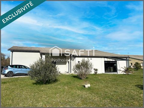 Maison avec hangar. Grand volume de stockage.