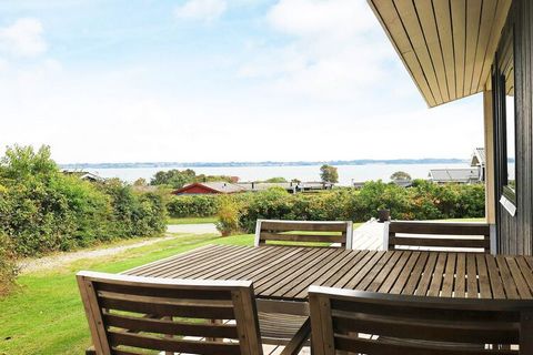 Renovated cottage in the attractive Helnæs Sommerland with sweeping ocean views. The house is approx. 350 m from the beach which offers many activities year round. During the summer season there is also a large jetty. The house is furnished with thre...