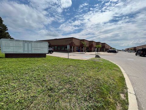 Excellent opportunity in high demand area. Back portion of the unit only with man door, kitchen, office space and 2 pc bathroom. Large mezzanine not included in square footage. Great for warehousing, light industrial / manufacturing, NO auto uses. Co...
