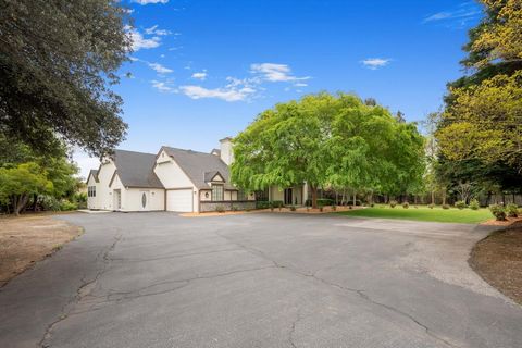 Morgan Hill Country Living in the City! Beautiful, ONE OF A KIND-5 Bedroom, 3 1/2 Bathroom CUSTOM ESTATE! Situated on over an acre, this home boasts over 4450 SqFt! TWO PRIMARY SUITES-one AMAZING Suite DOWNSTAIRS with a MASSIVE walk/in closet, & a SI...