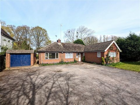 Nestled amidst picturesque surroundings with captivating views of open fields and set on an expansive plot spanning about three quarters of an acre, this impressive detached bungalow will appeal to those seeking a location that combines a rural setti...