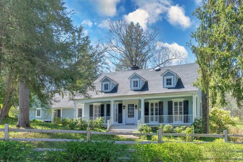 Welcome to this historic gem nestled on over 21 acres with gorgeous mature plantings in Millbrook, just 5 minutes from the Village. Built in 1776 by the esteemed De La Vergne family, who once owned all the land to Innisfree Garden, this remarkable pr...