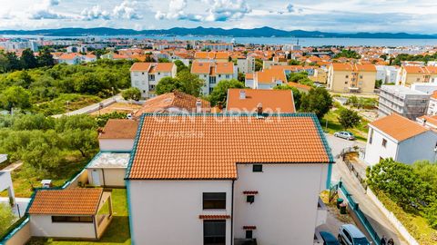 ZADAR, SKROČINI, RESIDENTIAL BUILDING WITH 5 SEPARATE APARTMENTS WITH BEAUTIFUL SEA VIEW!   We mediate in the sale of beautifully decorated and maintained residential buildings in the quiet settlement of Skročini, with a wonderful view of the sea. Th...