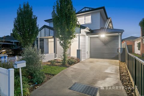 This contemporary four-bedroom, three bathroom home is set to impress with its chic design, premium fixtures, flexible spaces and all-round low-maintenance upkeep. The charming facade opens to warm interiors underscored by beautiful timber floors, wh...
