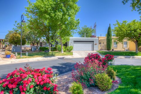 Welcome Home to this Beautifully Updated One-Story Home in the Gated Community of Tanoan West! This Home Features Granite Counters, Updated Kitchen Cabinets, SS Gas Stove, Microwave and Dishwasher! The Great Room Includes Tongue and Groove Beamed Cei...