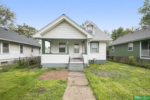 Lisa Marie Zimmerman, M: ... , ... , ... - This charming 1.5-story home in Miller Park is a gem! Conveniently close to Metropolitan Community College, it boasts a spacious flat-fenced yard, off-street parking, and a garage at the back. With a bathroo...