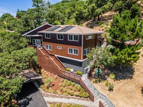 Nestled amidst the serene landscape with breathtaking views of Mt Tam, open space & Sleepy Hollow, this private oasis offers a tranquil retreat from the bustling world. The property boasts 3300+ square feet of living space on approx 1 acre, w/ 4 bedr...