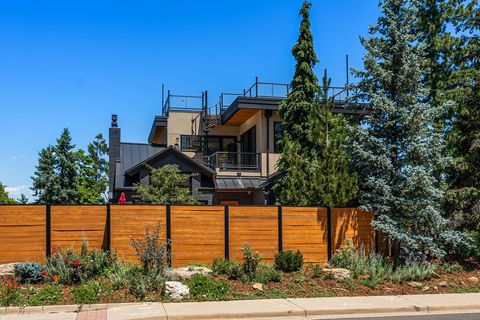 Welcome to your dream home, a modern industrial masterpiece situated at the base of historical Chautauqua Park and the iconic Flatirons. This stunning rare property offers 360-degree views and immediate access to over 48 miles of world-class hiking t...