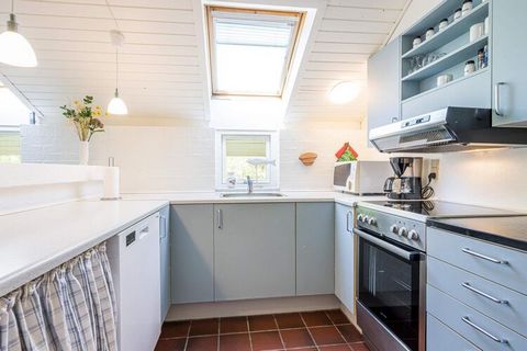 In the middle of Houstrup Plantage is this lovely red stone cottage with sauna. The cottage is furnished with kitchen and living room in open connection with each other. In the living room there is carpet, just as the wood stove is located here. From...