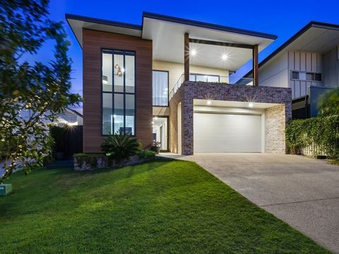 Nestled on a serene, tree-lined waterfront street, this stunning property boasts breathtaking canal views extending towards the Glasshouse Mountains. Perfectly balancing privacy with a vibrant community lifestyle, this home is just minutes from Popul...