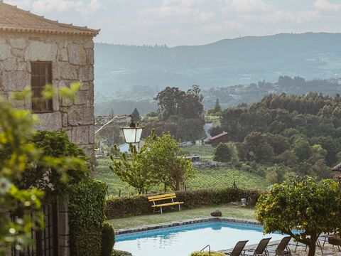 Palheiro A is one of the 6 fully equipped apartments of Quinta Santo António, a Rural Tourism farm, located in the northwest of Portugal, with a fantastic swimming pool and gardens, shared by the guests, of which you may enjoy incredible views of Min...