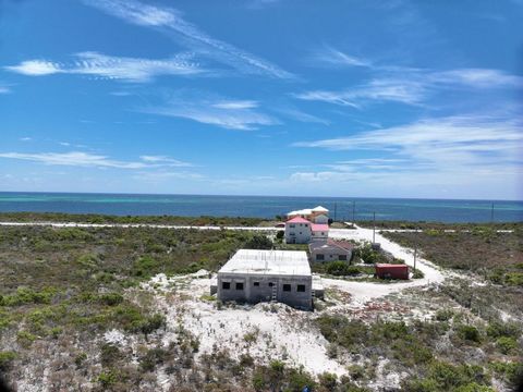 Partially finished 3,250 sq. ft., 2 storey four plex in prime, central, east coast Grand Turk with 360 degree views of the island. The lower level 2 bedroom / 2 bath owner's suite is move in ready with concrete ceiling and top of the line windows. Th...