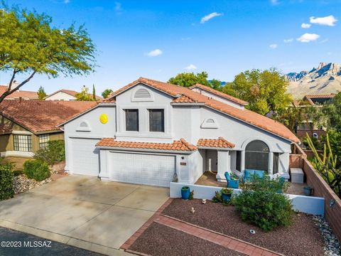 Park like setting in backyard with turf grass, outdoor kitchen with BBQ and an 8 foot deep pool. Enter the stunning family room with cathedral high ceilings. The remodeled kitchen with Quartz Counters and tiled backsplash makes it perfect for hosting...