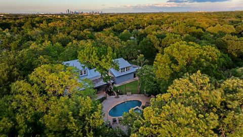 Welcome to 3609 Country White Lane, nestled in the heart of South Austin's picturesque Sunset Valley. This enchanting home sits majestically on over 2 acres in the middle of Sunset Valley, a bustling low tax rate municipality minutes from Downtown Au...