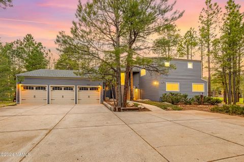 Welcome to your forest retreat! Nestled among the serene Ponderosa Pines, this exceptional property offers the perfect blend of comfort and seclusion. Embrace tranquility on the expansive forested lot. Tucked away from the street, you'll enjoy peace ...