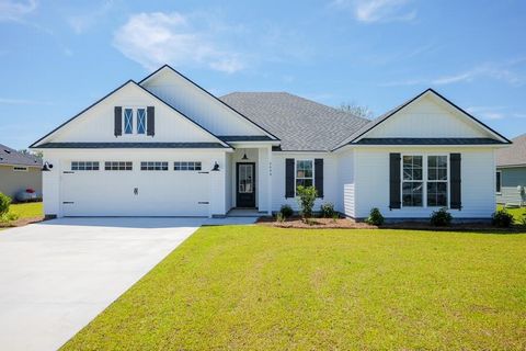 Welcome to your dream home! This beautifully designed residence features 4 spacious bedrooms, 2 baths, and a split floor plan that seamlessly blends a great room and kitchen concept. The open great room/kitchen layout creates an inviting atmosphere p...