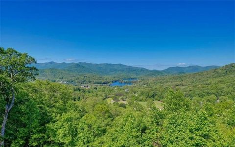 Nestled atop the picturesque North Georgia Mountains, this exclusive 6.8-acre parcel offers an unparalleled opportunity to create your dream retreat. With breathtaking, panoramic views of Brasstown Bald, the highest peak in Georgia, and the serene wa...