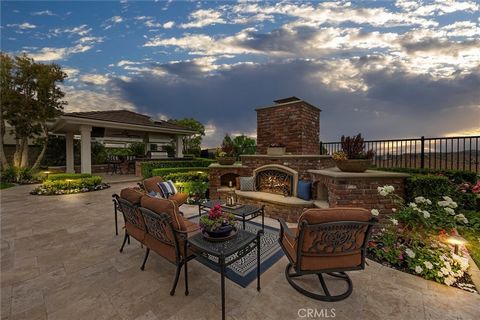 Prepare to fall in love with this real show stopper! Nearly every inch of this exquisite panoramic view estate situated in the sought after Pinnacle community of Vista del Verde has been improved upon! The inviting brick pathway accented by pristine ...