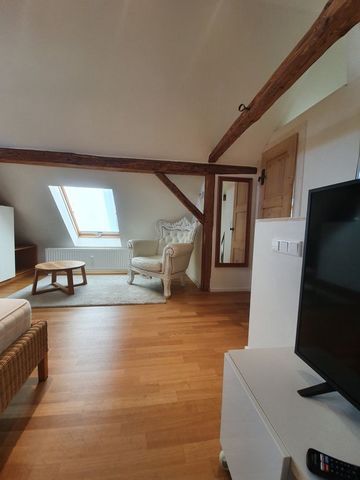 - Charming apartment in converted barn - 41qm over 2 floors - ground floor: cloakroom, dining area, table, kitchen - Living upstairs: living-bedroom, bathroom, shower - Private outdoor terrace invites you to linger in the sun Equipment - fully furnis...