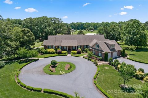 Magnolia Springs, the epitome of country elegance in this custom-built estate. Spread across a generous 4100 sqft, this home features four spacious bedrooms and 5.5 bathrooms, ensuring plenty of private space for everyone. The property's well-crafted...