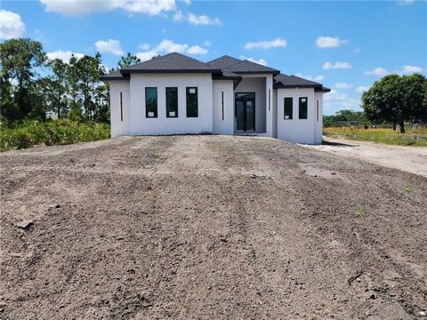 Introducing a stunning Brand New Construction home in the heart of Golden Gate Estates! This Open Floor plan is flooded with natural light and features a spacious kitchen with a large island perfect for entertainment, quartz countertops and stainless...