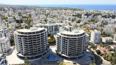 Appartamenti con vista mare in un complesso privato a Girne, Cipro del Nord Gli appartamenti si trovano in una posizione suggestiva a pochi passi dal mare e dai servizi quotidiani a Girne, Cipro Nord. Girne è una città in via di sviluppo, un'antica c...