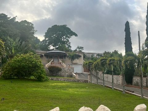 Beautiful lawns surround this well-kept home on over half acre and only 5 mins from Mandeville town centre. With large living areas and a very sizeable master bedroom suite with large closet and bathroom, this home is perfect for who wants to live co...
