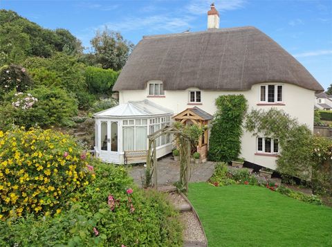 As the name would suggest this most attractive detached period cottage was formerly the village Post Office and is delightfully situated on the edge of the Exmoor National Park in a peaceful West Somerset village enjoying wonderful views over farmlan...